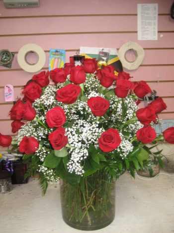 Mr Bokay's Luxury 50 Red Roses in Glass Vase