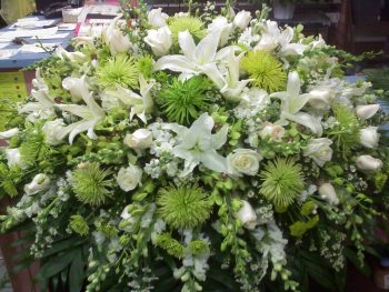 CS-11: Shades of Green & Yellow Casket Spray by Mr Bokay Florist